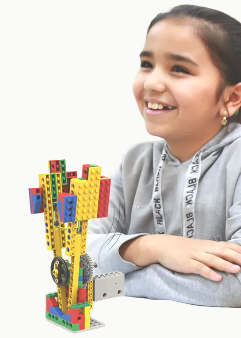 Kids building engineering kits at Young Engineers Toronto East End
